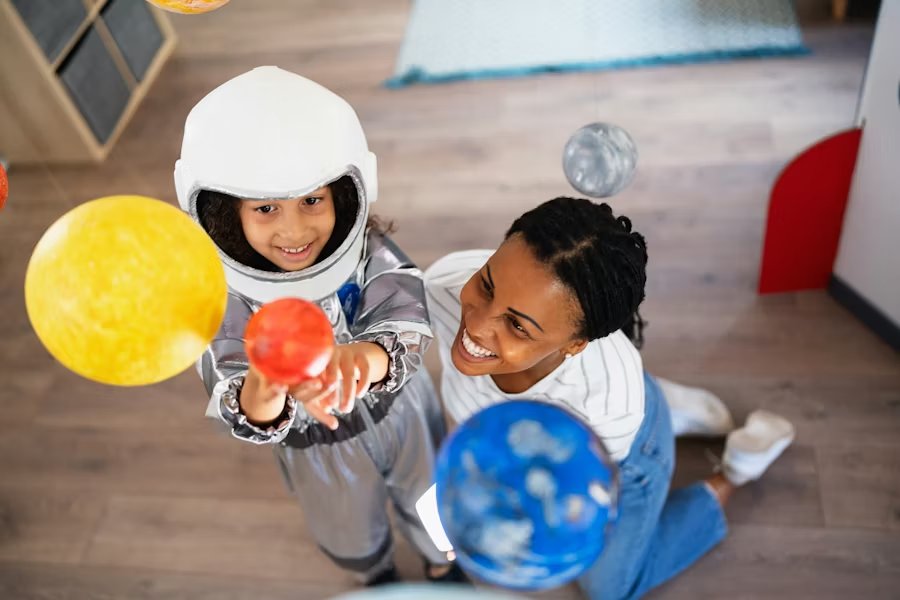 Woman in a bright office with laptop, looking sharp and in control