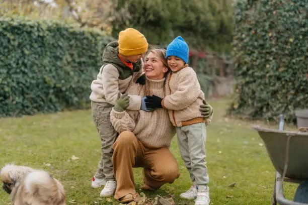 Woman focused on laptop screen, coffee to her side, clearly in flow state